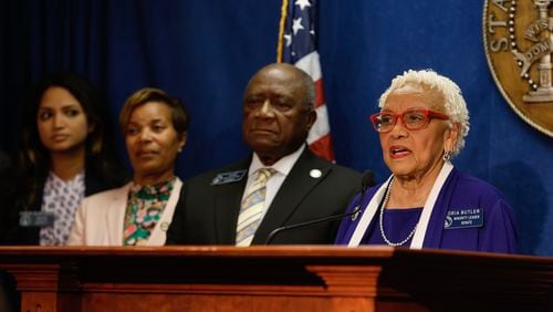 Sen. Gloria Butler (right), D-Stone Mountain, and members of the Senate Democratic Caucus held a news conference at the state Capitol last week to discuss Medicaid expansion.
