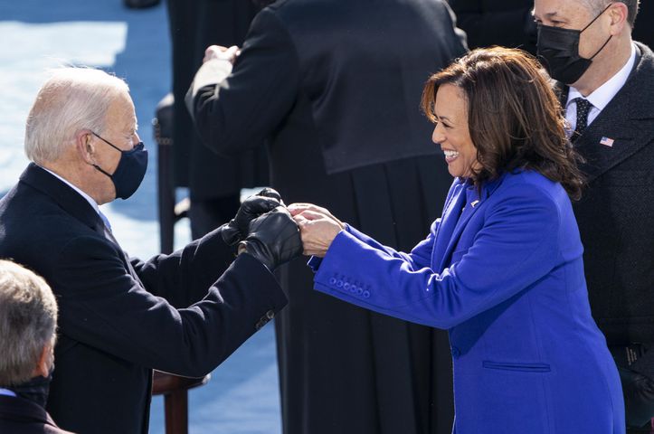 After being sworn in Vice President Kamala Harris gives Joe Biden a fist bump at the Capitol in Washington in Washington on Wednesday, Jan. 20, 2021. (Ruth Fremson/The New York)