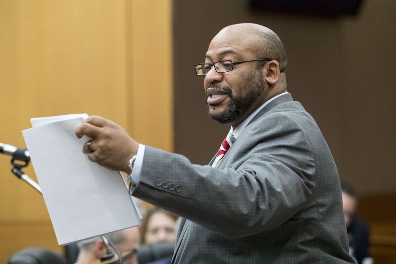 Fulton County Chief Assistant District Attorney Clint Rucker speaks to Fulton County Superior Court Chief Judge Robert McBurney about potential jurors during the second day of jury selection for the Tex McIver case at the Fulton County Courthouse on Tuesday, March 6, 2018. (ALYSSA POINTER/alyssa.pointer@ajc.com)