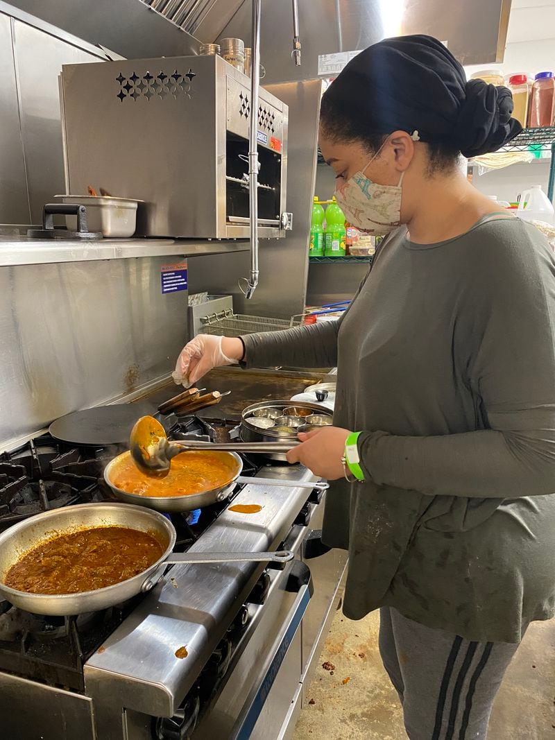 Star Naidu prepares curries at the space she rents at the Cloud Kitchen facility on Atlanta's upper Westside. Ligaya Figueras/ligaya.figueras@ajc.com
