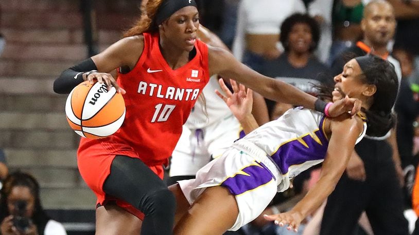Dream All-Star Rhyne Howard (left) will try to dethrone three-time event winner Allie Quigley of the Sky on Saturday in a 3-point contest in Chicago. (Curtis Compton / Curtis.Compton@ajc.com)