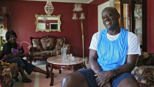 When Georgia decided to lock up repeat felons and throw away the key, Darion Barker, here at his mother's house in Macon, was among those whose cell key was tossed. He was the first inmate to be released uner a new law.