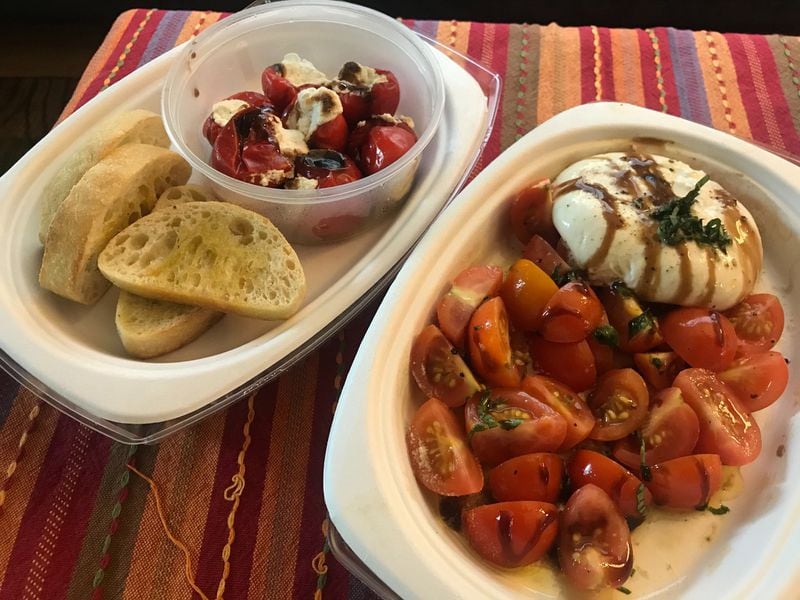 Forno Vero offers a variety of Italian dishes, including starters like stuffed peppadews (left) and a bella salad (right) of burrata cheese, heirloom tomatoes, basil, olive oil and balsamic vinegar. LIGAYA FIGUERAS / LIGAYA.FIGUERAS@AJC.COM