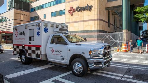 An ambulance leaves Grady Memorial Hospital in Atlanta. Paramedics, EMTs and nurses are part of the response teams at Grady EMS. (Steve Schaefer / steve.schaefer@ajc.com)