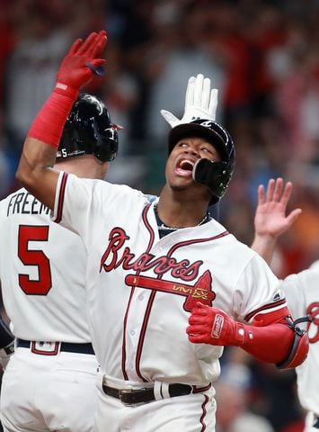 Photos: Acuna, Freeman lead Braves to playoff win over Dodgers