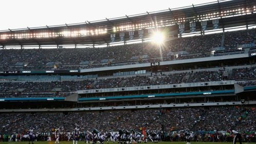 The parking lot at Lincoln Financial Field in Philadelphia was the site where two diehard Eagles fans were married Sunday.