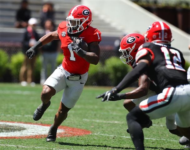 Georgia running back Trevor Etienne makes a long gain during the G-Day game on Saturday, April 13, 2024 in Athens.  Curtis Compton for the Atlanta Journal Constitution