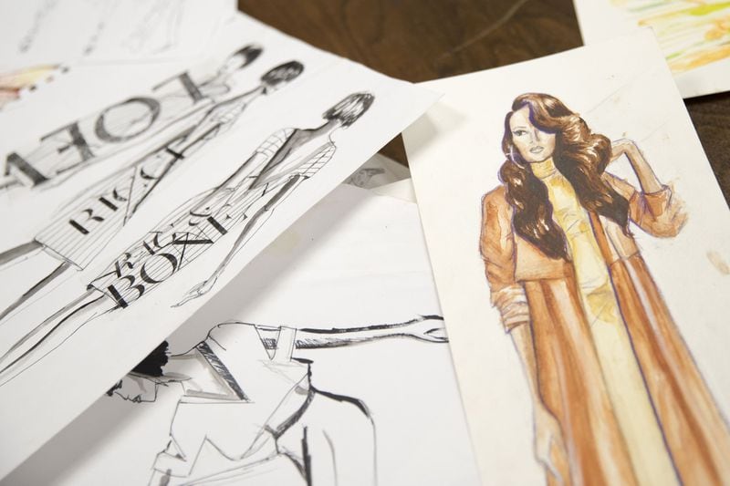 Fashion design sketches by Savannah College of Art and Design senior Ronnita Whipple lie on a table at the campus in Atlanta on Monday, Feb. 26, 2018. ALYSSA POINTER/ALYSSA.POINTER@AJC.COM