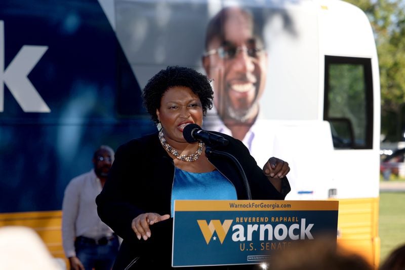 Democratic gubernatorial nominee Stacey Abrams introduces Democratic U.S. Sen. Raphael Warnock at a rally Wednesday in Marietta, saying Georgia needs “someone who can articulate the vision we have of the future.” (Jason Getz / Jason.Getz@ajc.com)