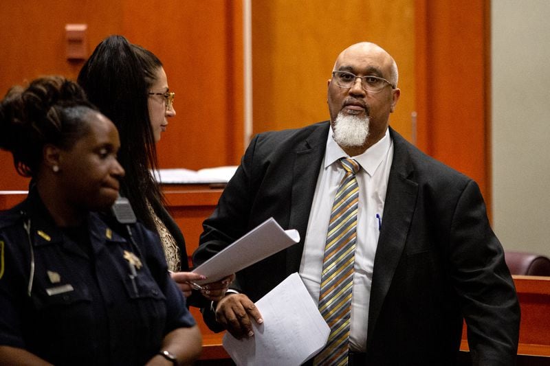 Public Defender Daryl Queen walks back to his chair during the jury selection portion of the trial of Gregory Williams, a mentally ill veteran who is accused of killing his grandmother in 2017, in the DeKalb County Courthouse Monday.   STEVE SCHAEFER / SPECIAL TO THE AJC