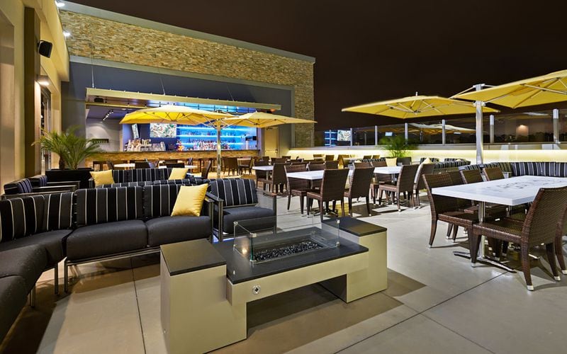 The rooftop terrace at Top Golf provides a cozy setting to relax.