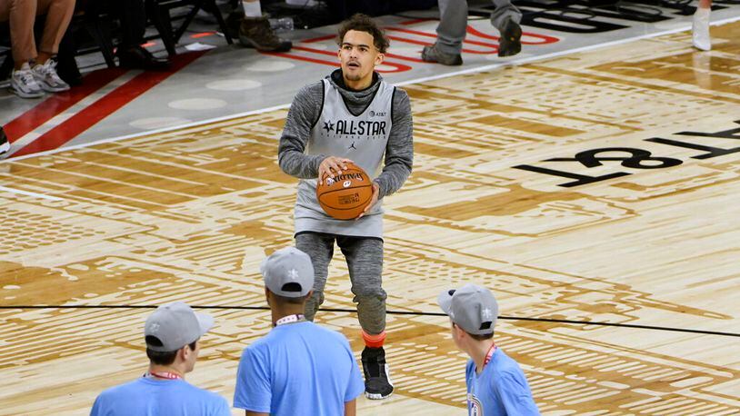 Trae Young of the Atlanta Hawks warms up during practice earlier Saturday, Feb. 15, 2020, in Chicago. (AP Photo/David Banks)