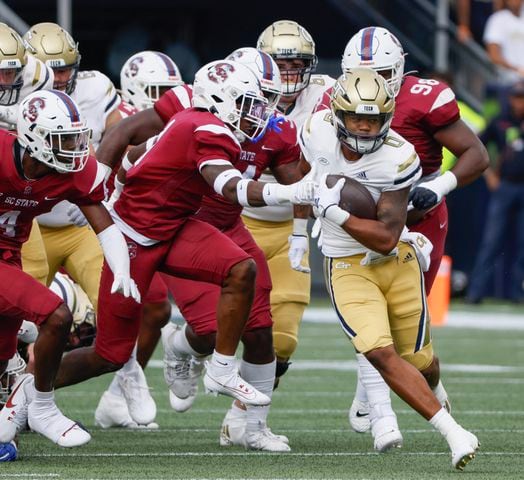 Georgia Tech Yellow Jackets running back Trey Cooley runs for a first down during a football game against South Carolina State at Bobby Dodd Stadium in Atlanta on Saturday, September 9, 2023.   (Bob Andres for the Atlanta Journal Constitution)