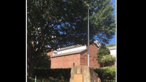 This picture posted on Twitter by Chanel 2 Action News' Justin Wilfon shows where the Confederate flag flew in downtown Kennesaw before it was cut down.