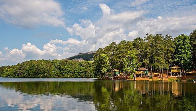 Stone Mountain Park's yurts are located by a scenic lake.