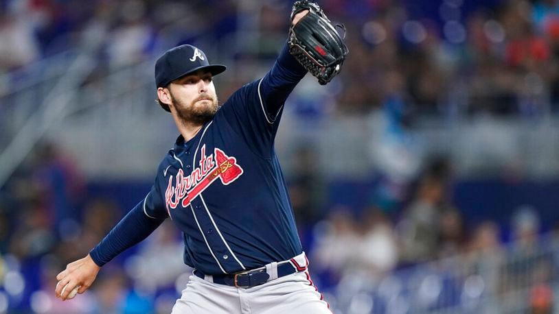 Atlanta Braves' Ian Anderson delivers a pitch during the first inning of the second game of a baseball doubleheader against the Miami Marlins, Saturday, Aug. 13, 2022, in Miami. (AP Photo/Wilfredo Lee)