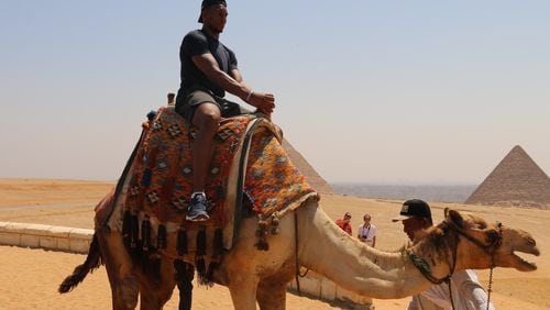 Josh Okogie's time in Egypt included a visit to the Pyramids of Giza and a moment in the saddle of a camel.