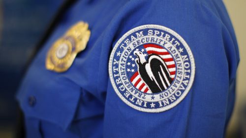 A TSA arm patch is seen at Los Angeles International Airport (LAX). A woman with breast cancer claimed that she was "violated" and "humilated" by a TSA officer (not pictured) in LAX. (Photo by David McNew/Getty Images)