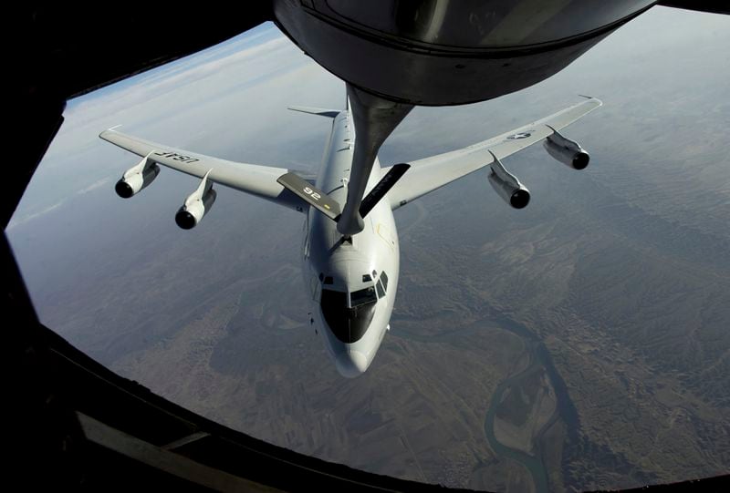 A U.S. Air Force photo shows an E-8C Joint Surveillance Target Attack Radar System, or JSTARS, receiving fuel from a KC-135 tanker plane in 2004. The JSTARS based at Robins Air Force Base are being phased out, but President Joe Biden has identified new missions for personnel at the military installation. (U.S. Air Force via The New York Times)