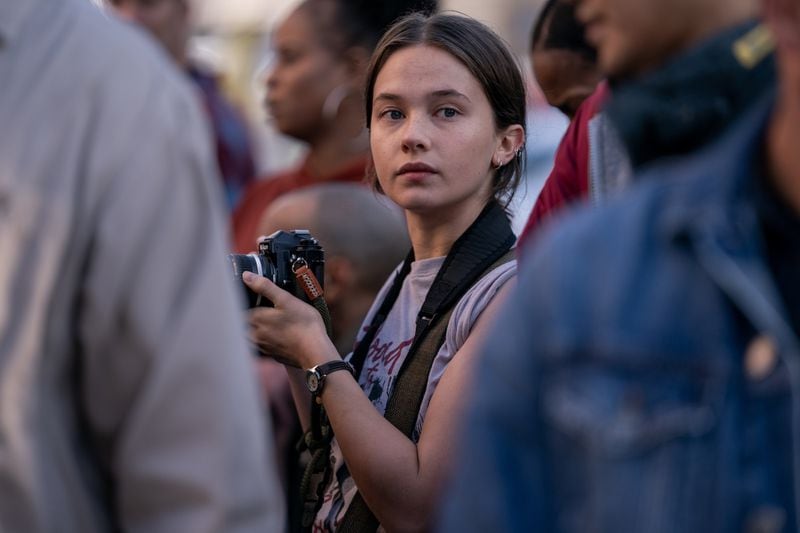 Cailee Spaeny stars as an aspiring photojournalist in British director Alex Garland's "Civil War."
(Courtesy of A24 / Murray Close)