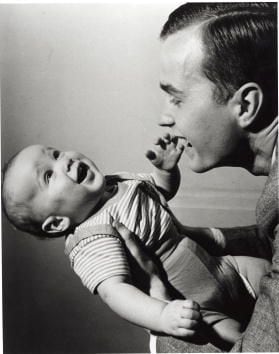 1947: George Bush Sr. holds a young George W.