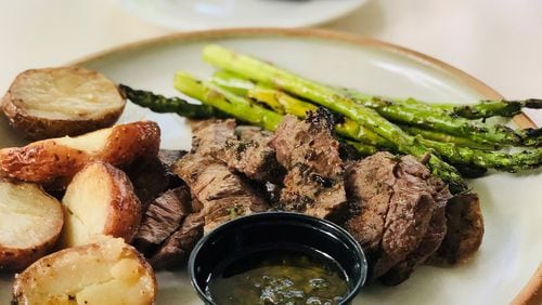 Mediterranea’s steak-frites comes with roasted potatoes, asparagus and chimichurri. CONTRIBUTED BY WENDELL BROCK