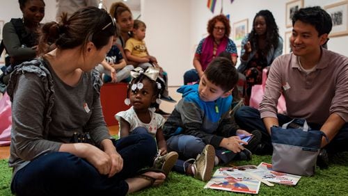 Visitors enjoy the reading corner at a recent “Second Sunday” at the High Museum. Promoting regular programming like this free event has been one key element of the High’s impressive success at boosting diversity and inclusivity.   Photo by Alphonso Whitfield.