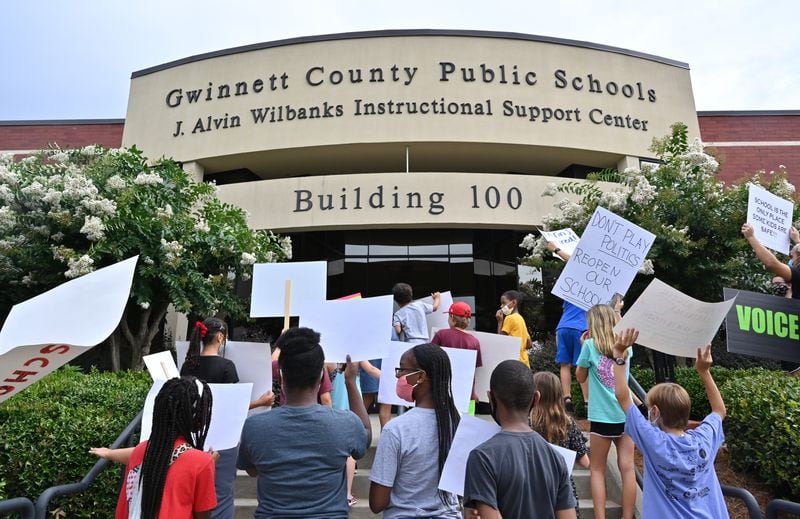 On July 24, 2020, parents, students and supporters rallied outside Gwinnett Schools Instructional Support Center, which bears the superintendent's name. There were protesting the district's plan for the upcoming school year, which was later broadened to include both in-person and online-only learning. (Hyosub Shin / Hyosub.Shin@ajc.com)