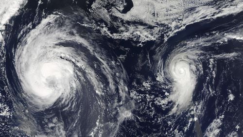 An image created by two NASA satellite images of Tropical Storm Leslie and Hurricane Michael spinning in the Atlantic Ocean in September 2018. This year’s Atlantic hurricane season should be “near normal,” government forecasters announced on May 23, 2019, with the likelihood of nine to 15 named storms, and two to four major Category 3 hurricanes with winds of 111 miles per hour or greater. NASA/Goddard via The New York Times
