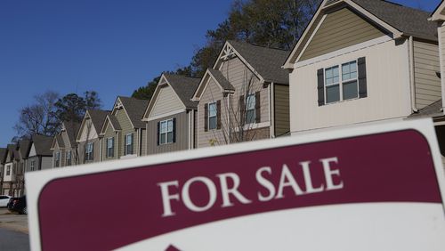 A home is advertised for sale in McDonough.  (Natrice Miller/natrice.miller@ajc.com)