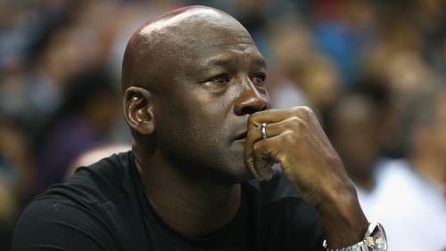Owner of the Charlotte Hornets, Michael Jordan, watches on during their game against the Atlanta Hawks at Time Warner Cable Arena on Nov. 1, 2015, in Charlotte, North Carolina. (Photo by Streeter Lecka/Getty Images)