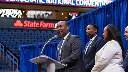 Democratic National Committee Chair Jaime Harrison, from left, Atlanta Mayor Andre Dickens and U.S. Rep. Nikema Williams speak to journalists after touring State Farm Arena in July as part of Atlanta’s bid to host the 2024 Democratic National Convention. Ben Gray for The Atlanta Journal-Constitution