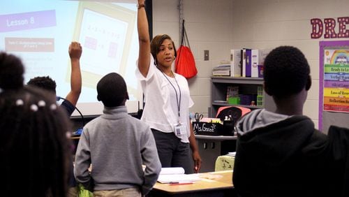 Sandrea Goree, a teacher at Perkerson Elementary School, instructs her students to count by twos on Thursday, August 15. Jenna Eason / Jenna.Eason@coxinc.com