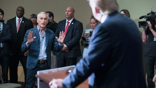 Republican presidential candidate Donald Trump fields a question from Univision and Fusion anchor Jorge Ramos during a press conference held before his campaign event at the Grand River Center on August 25, 2015 in Dubuque, Iowa. Earlier in the press conference Trump had Ramos removed from the room when he failed to yield when Trump wanted to take a question from a different reporter.(Photo by Scott Olson/Getty Images)