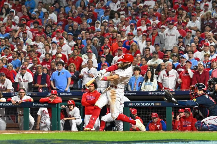 Philadelphia Phillies center fielder Brandon Marsh hits a home run against the Atlanta Braves during the ninth inning of NLDS Game 3 in Philadelphia on Wednesday, Oct. 11, 2023.   (Hyosub Shin / Hyosub.Shin@ajc.com)