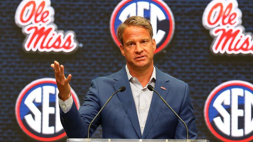 Ole Miss coach Lane Kiffin takes questions during his news conference Monday at SEC Media Days at the College Football Hall of Fame in Atlanta. (Curtis Compton / Curtis Compton@ajc.com)