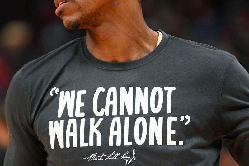 Atlanta Hawks guard Jeff Teague wears a warmup shirt with a quote by Dr. Martin Luther King Jr. before an NBA basketball game against the Toronto Raptors, Monday, Jan. 20, 2020, in Atlanta.