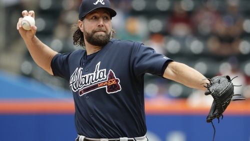 Braves pitcher R.A. Dickey delivers a pitch against the New York Mets on Thursday, April 27, 2017, in New York. (AP Photo/Frank Franklin II)
