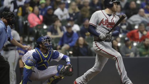 Atlanta Braves&#039; Freddie Freeman hits a two-run home run during the ninth inning of a baseball game against the Milwaukee Brewers Friday, April 28, 2017, in Milwaukee. (AP Photo/Morry Gash)