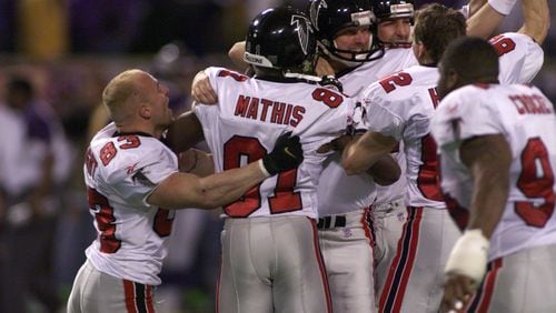 980117 Minneapolis, MN-Atlanta Falcons Morten Andersen (3rd from left)reacts and celebrates with his teammates after his winning field goal that sends the Faclcons to the Super Bowl. (AJC Staff Photo/Marlene)