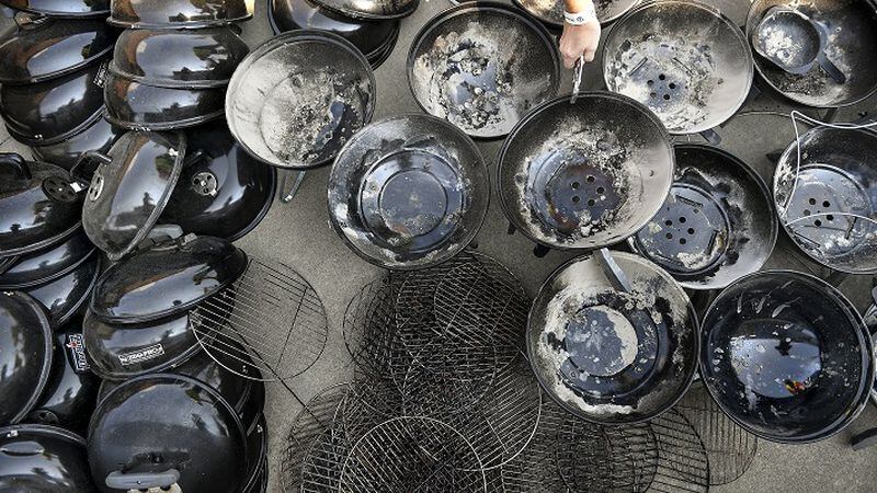 After the conclusion of the American Royal Kids Que competiton, the 11th annual contest of young barbeque chefs, the portable grills were emptied of their charcoal and set aside for pickup at Kansas Speedway. (David Eulitt/Kansas City Star/TNS)