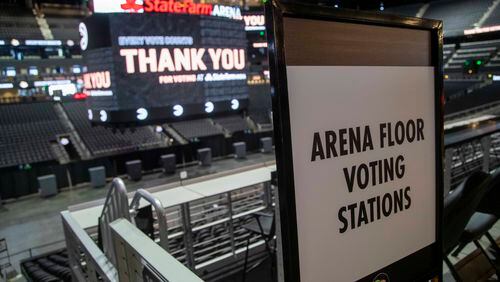 07/17/2020 - Atlanta, Georgia - A sign advising voters of arena floor voting stations is displayed during a tour of State Farm Arena in Atlanta, Friday, July 17, 2020. State Farm Arena, home of the Atlanta Hawks, will host early voting and the 2020 presidential election for Fulton County registered voters.  (ALYSSA POINTER / ALYSSA.POINTER@AJC.COM)