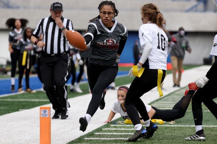 Hillgrove running back Jasmine Blackmon is stopped for a short gain in the first half against West Forsyth during the Class 6A-7A Flag Football championship at Center Parc Stadium Monday, December 28, 2020 in Atlanta, Ga.. JASON GETZ FOR THE ATLANTA JOURNAL-CONSTITUTION