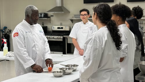 James Bryant (left), culinary instructor at Berkmar High, has been named the ProStart Teacher of the Year.
