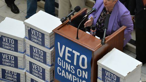 Sen. Nan Orrock speaks during a March rally opposing campus carry. The group delivered 30,000 petitions to Gov. Nathan Deal's office urging a veto of the bill that would allow those 21 years and older to carry a weapon on college campus. BRANT SANDERLIN/BSANDERLIN@AJC.COM