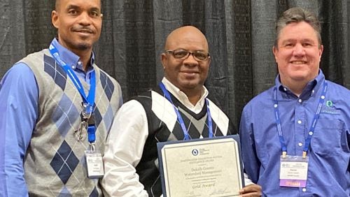 Pictured from left, DeKalb County Department of Watershed Management’s David Hayes, Willie Horton and Darren Eastall accepted the 2019 Collection Systems Gold Award on behalf of the county. COURTESY OF DEKALB COUNTY