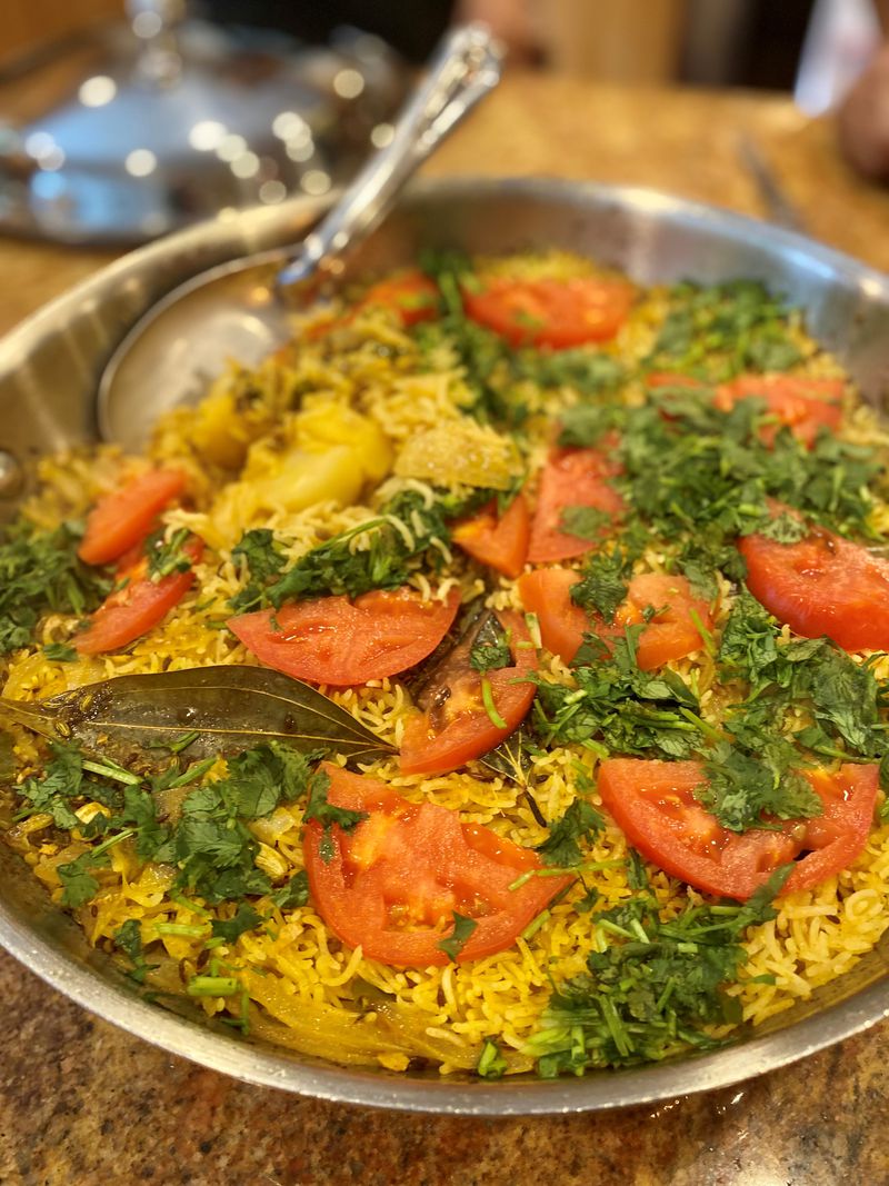 Purnima Malhotra made this vegan tahiri (rice pilaf with potatoes) often during the pandemic. (Wendell Brock for The Atlanta Journal-Constitution)