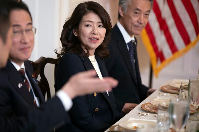 Japan first lady Yuko Kishida, center, is flanked by Prime Minister Fumio Kishida, left and Shigeo Yamada, Japan Ambassador to the United States, during a luncheon in honor of the Prime Minister at the North Carolina Executive Mansion, Friday, April 12, 2024, in Raleigh, N.C. (Robert Willett/The News & Observer via AP, Pool)