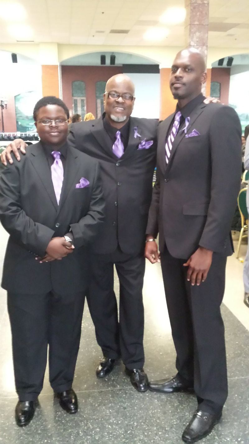 Gary Williams at the 2015 funeral of his former wife Zenna, with his two sons Brandon and Gary Jr. Williams. He said after Obama was elected he could “tell my son that he can be president of the United States if he wanted to be.” (Photo courtesy of Gary Williams)