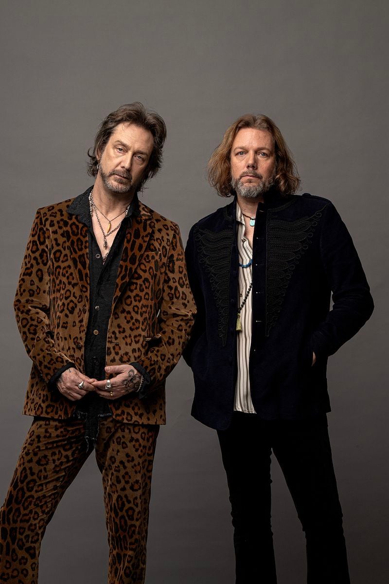Revisiting songs from their 1990 debut album "Shake Your Moneymaker" on an extended 2021 tour primed Chris (left) and Rich Robinson to produce their new album, "Happiness Bastards." "We innately just kinda knew we were on the same page again," Rich Robinson said. 
(Courtesy of Ross Halfin)

